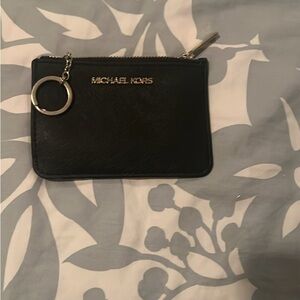 Michael Kors Black Wristlet with Silver Accents